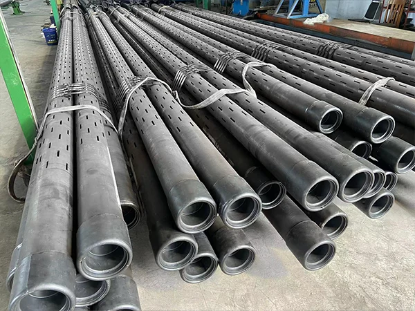 Slotted liners bundled with chains and nylon rope