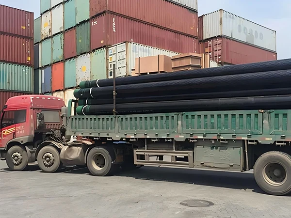 Slotted liners secured with nylon rope and steel frames for truck transportation